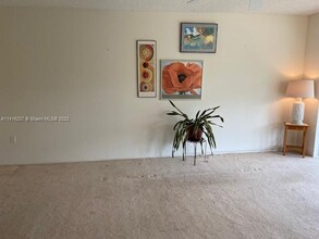 8341 Sands Point Blvd, Unit B303 in Tamarac, FL - Building Photo - Building Photo