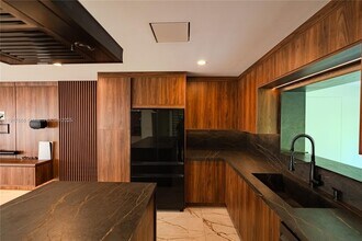 3711 Battersea Rd in Miami, FL - Building Photo - Building Photo