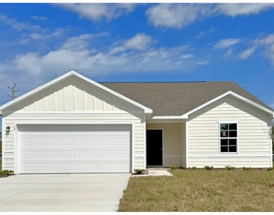 12 Rolling Fern Dr in Palm Coast, FL - Building Photo