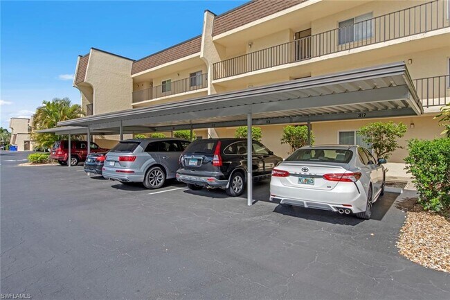 25806 Cockleshell Dr-Unit -317 in Bonita Springs, FL - Foto de edificio - Building Photo