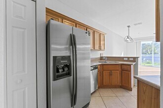 1002 Pipers Cay Dr in West Palm Beach, FL - Foto de edificio - Building Photo