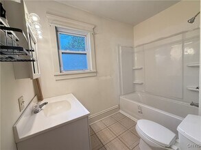 56 E 5th St in Oswego, NY - Building Photo - Building Photo