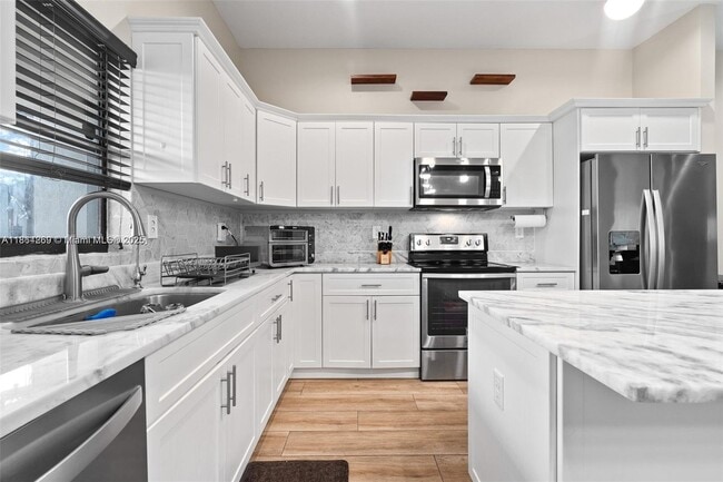 property at 9265 NW 16th St