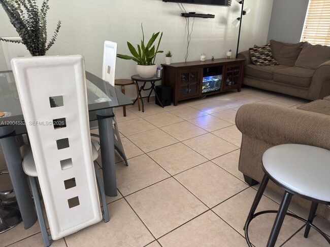 property at 6962 NW 179th St