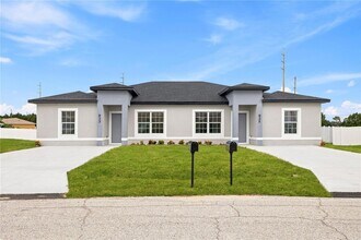 716 Desmoines Dr in Poinciana, FL - Building Photo - Building Photo