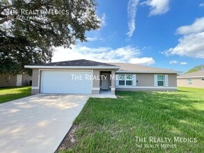 254 Malauka Run in Ocklawaha, FL - Building Photo - Building Photo