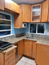 835 Winding Oaks Dr, Unit Shared yard Apt in Palm Harbor, FL - Building Photo - Building Photo
