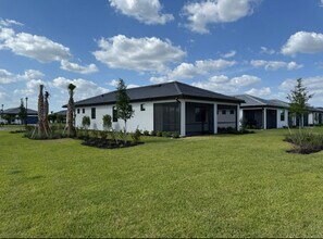 20605 Pebble Gln Dr in Estero, FL - Building Photo - Building Photo