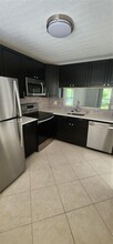 1278 S Military Trail-Unit -122 in Deerfield Beach, FL - Building Photo - Building Photo