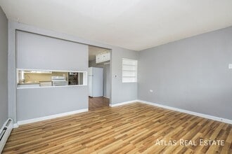 1044 S Quitman St in Denver, CO - Building Photo - Building Photo