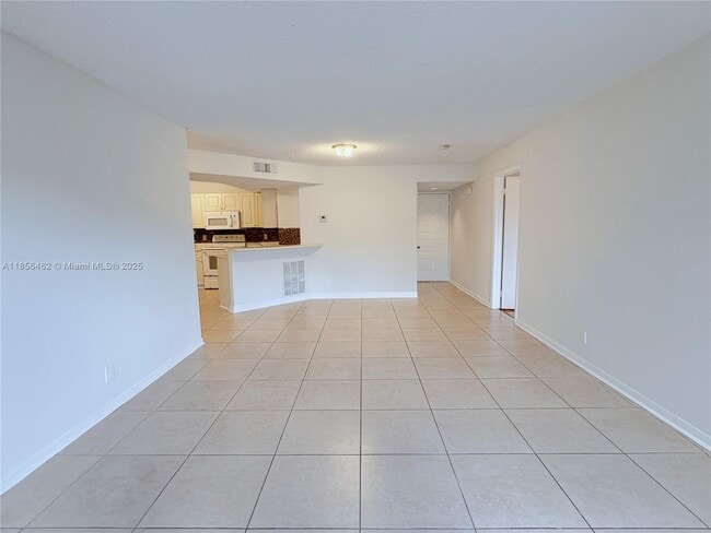 9055 Wiles Rd in Coral Springs, FL - Building Photo - Building Photo