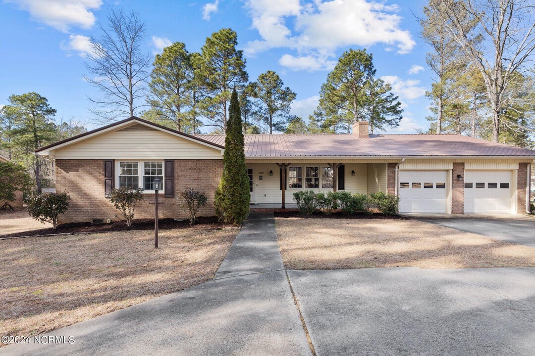 1220 Rays Bridge Rd in Whispering Pines, NC - Building Photo