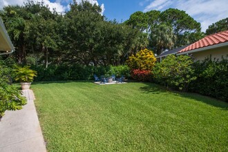 209 E Tall Oaks Cir in Palm Beach Gardens, FL - Building Photo - Building Photo