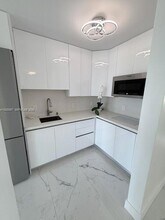1100 Alton Rd, Unit 5B in Miami Beach, FL - Building Photo - Building Photo