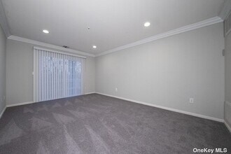 46 Sylvan Ln-Unit -46 in Port Jefferson Station, NY - Building Photo - Building Photo