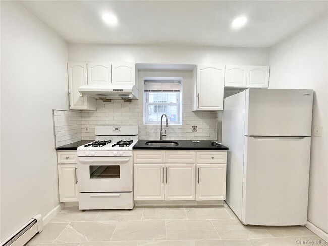 property at 41-59-59 70th St