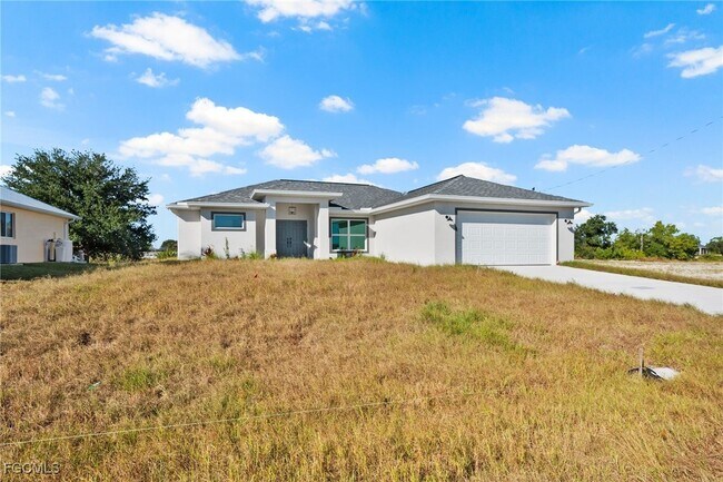 3078 NW 4th Pl in Cape Coral, FL - Building Photo - Building Photo