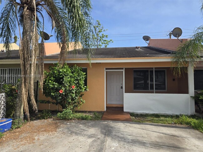 property at 585 NW 15th St