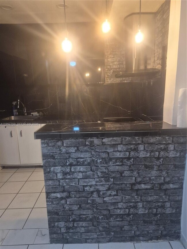 property at 4707 NW 7th St