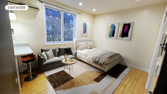 property at 318 E 62nd St
