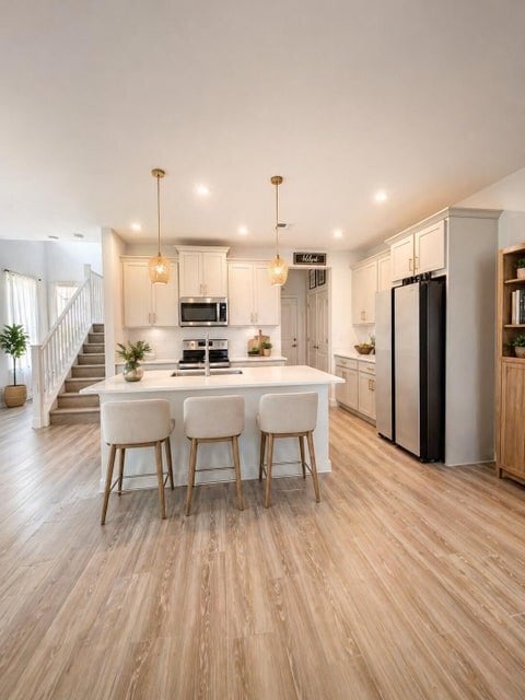 property at 14162 SW Thorens Dr