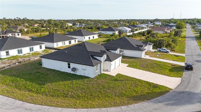 8448 Dinnano St in Port Charlotte, FL - Building Photo - Building Photo