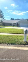 1327 Cherry Hills Rd NE in Palm Bay, FL - Building Photo