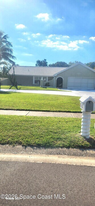 1327 Cherry Hills Rd NE in Palm Bay, FL - Building Photo