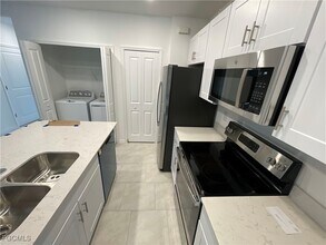 14237 Oviedo Pl in Tice, FL - Building Photo - Building Photo