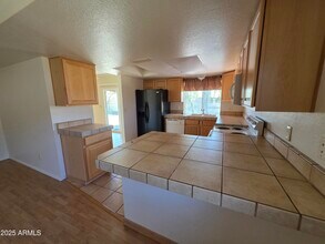 6037 W Zoe Ella Way in Glendale, AZ - Building Photo - Building Photo
