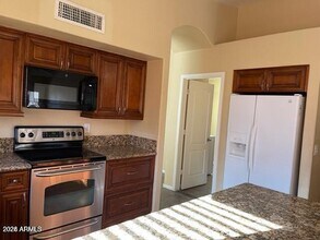 15820 W Latham St in Goodyear, AZ - Building Photo - Building Photo