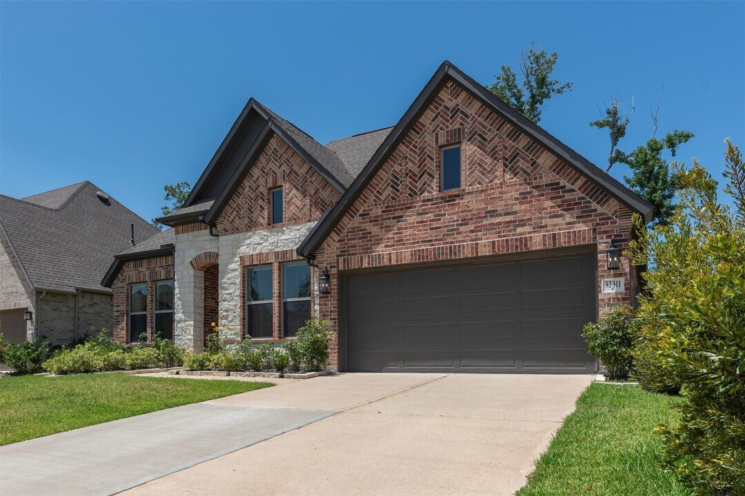 32311 Noble Crk Dr in Conroe, TX - Building Photo