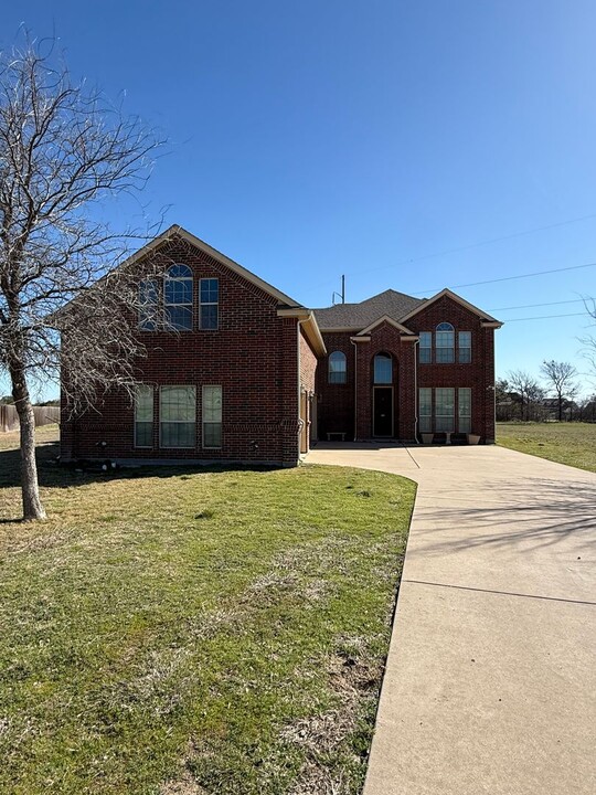 815 Blue Quail Dr in Weatherford, TX - Foto de edificio