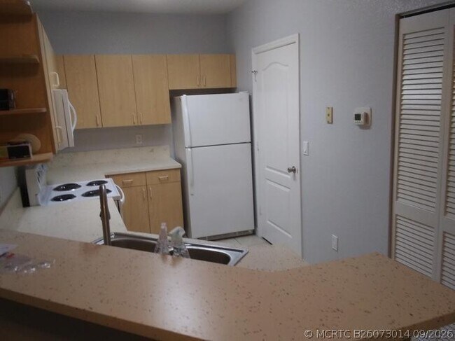 property at 128 SW Peacock Blvd