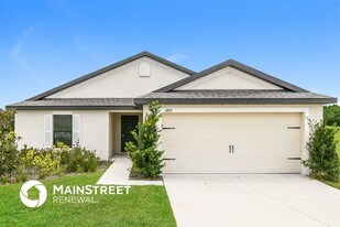 1495 Swan Lake Cir in Dundee, FL - Building Photo