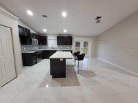 7605 Woodland Creek Ln in Greenacres, FL - Foto de edificio - Building Photo