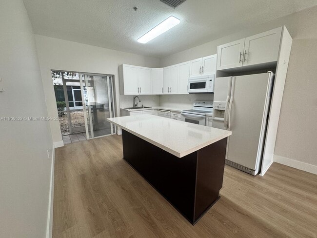 property at 5630 NW 114th Path