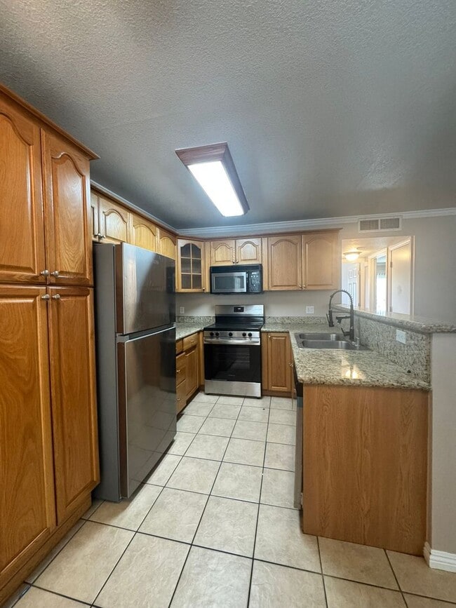 property at 2616 Alpine Blvd