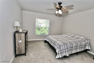 15413 Wildflower Cir in Naples, FL - Building Photo - Building Photo