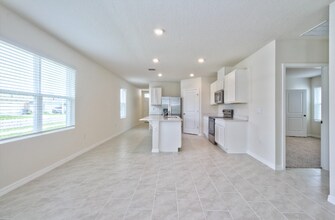 3302 Pine Lily Ave in Poinciana, FL - Building Photo - Building Photo