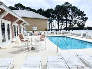 7009 N Lagoon Dr in Panama City, FL - Building Photo - Building Photo