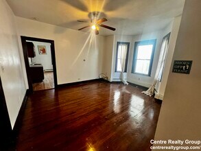 58 Mozart St, Unit 2 in Boston, MA - Foto de edificio - Building Photo