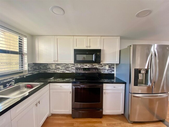 property at 8975 Palm Tree Ln