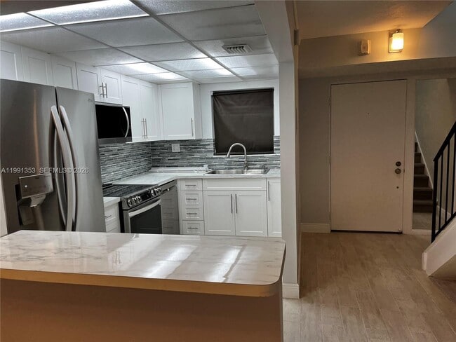 210 NW 87th Ave, Unit L218 in Miami, FL - Foto de edificio - Building Photo