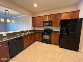 6937 Woody Vine Dr in Jacksonville, FL - Foto de edificio - Building Photo