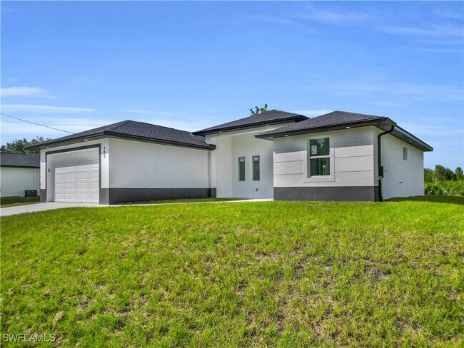 100 W 11th St in Lehigh Acres, FL - Building Photo - Building Photo