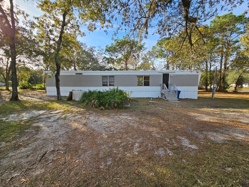 7841 Indian Trail Rd in Spring Hill, FL - Building Photo