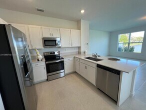 6931 Harbours Edge Ave in Lake Worth, FL - Building Photo - Building Photo