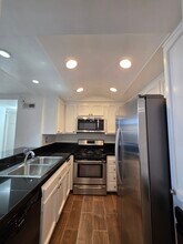 7800 Topanga Canyon Blvd, Unit 303 in Canoga Park, CA - Building Photo - Building Photo