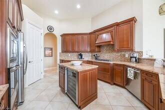 6504 Costa Cir, Unit 7017-101 in Naples, FL - Building Photo - Building Photo